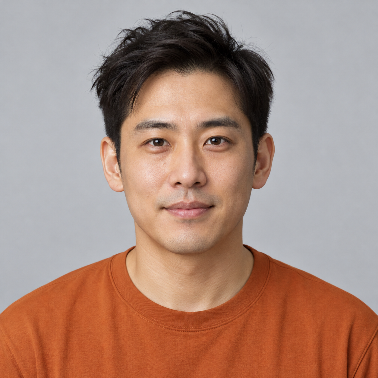 Reference photo of a fictional adult man in an orange shirt